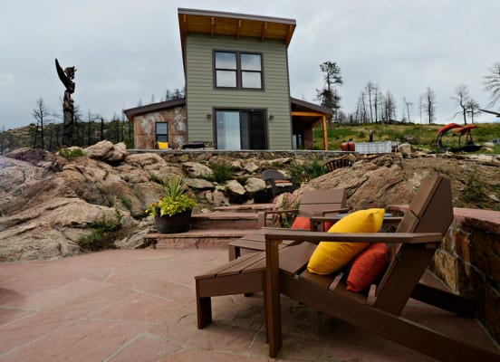 "David Cottrell and his wife Kristen Moeller have rebuilt their home following the forest fire in 2012. "